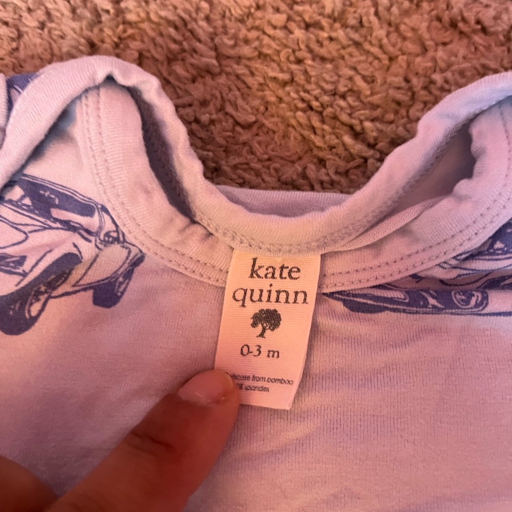 Kate Quinn knotted baby gown in cars